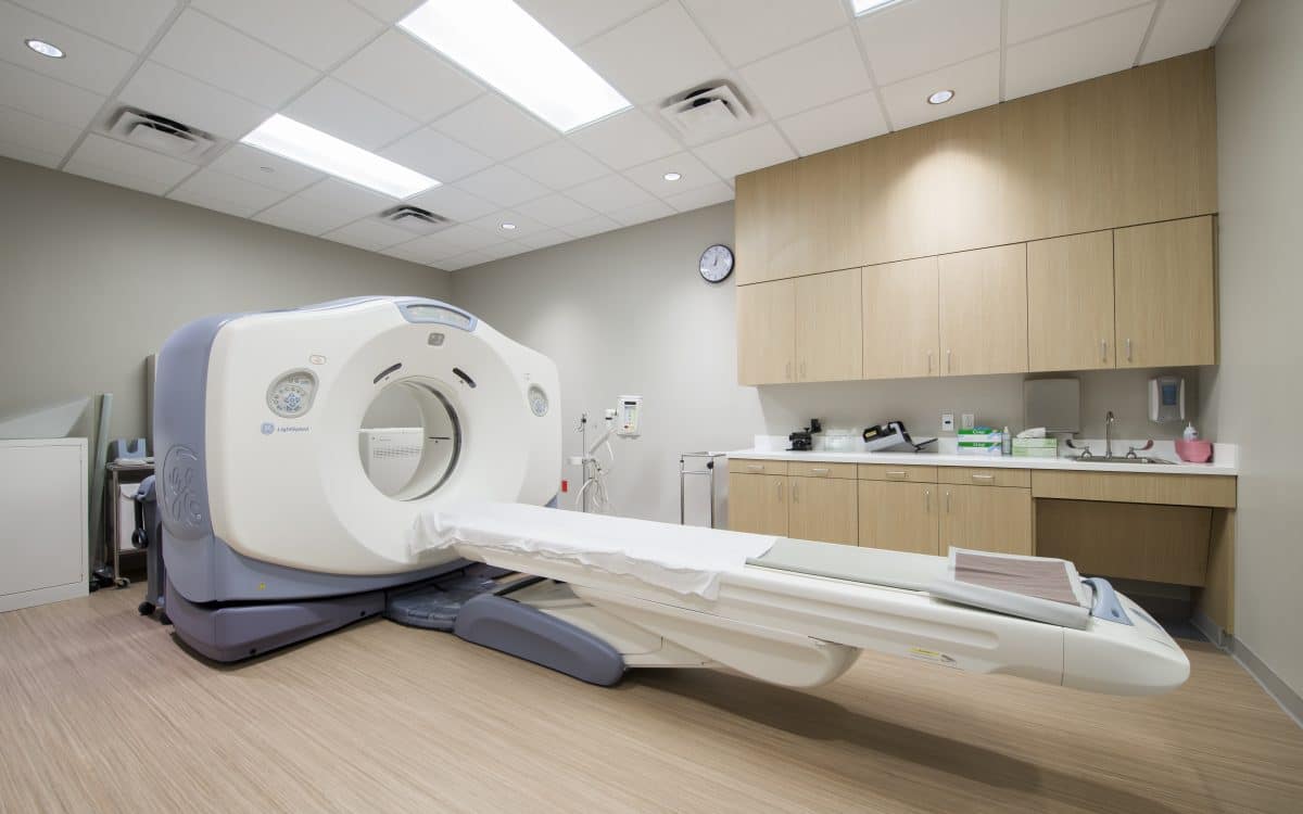 A large ct scanner in a room.
