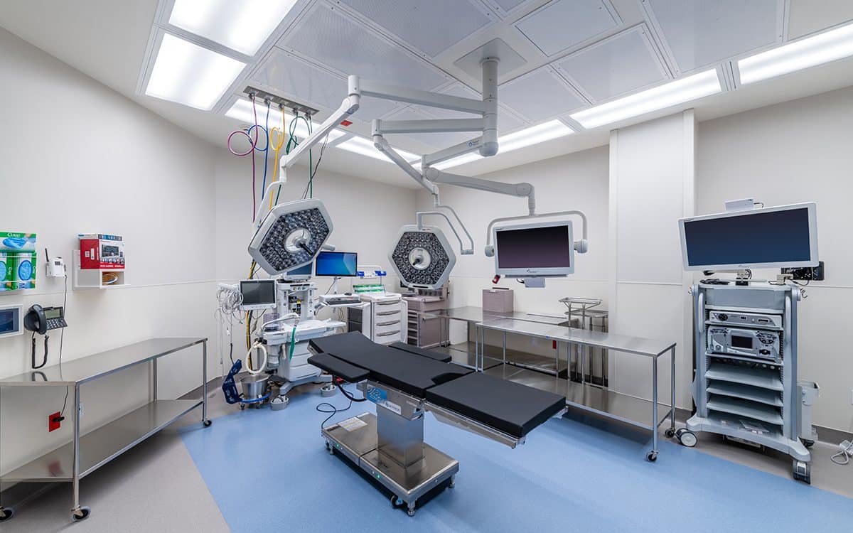 A room with medical equipment and monitors.