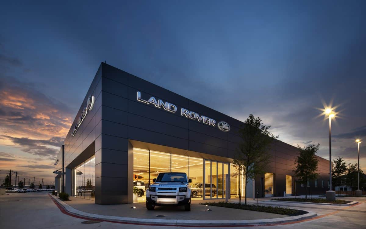 The land rover dealership at dusk.