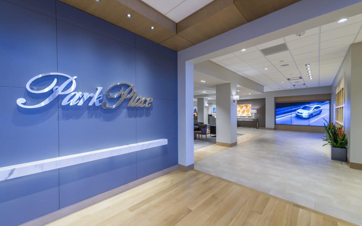A blue lobby with a sign that says park place.