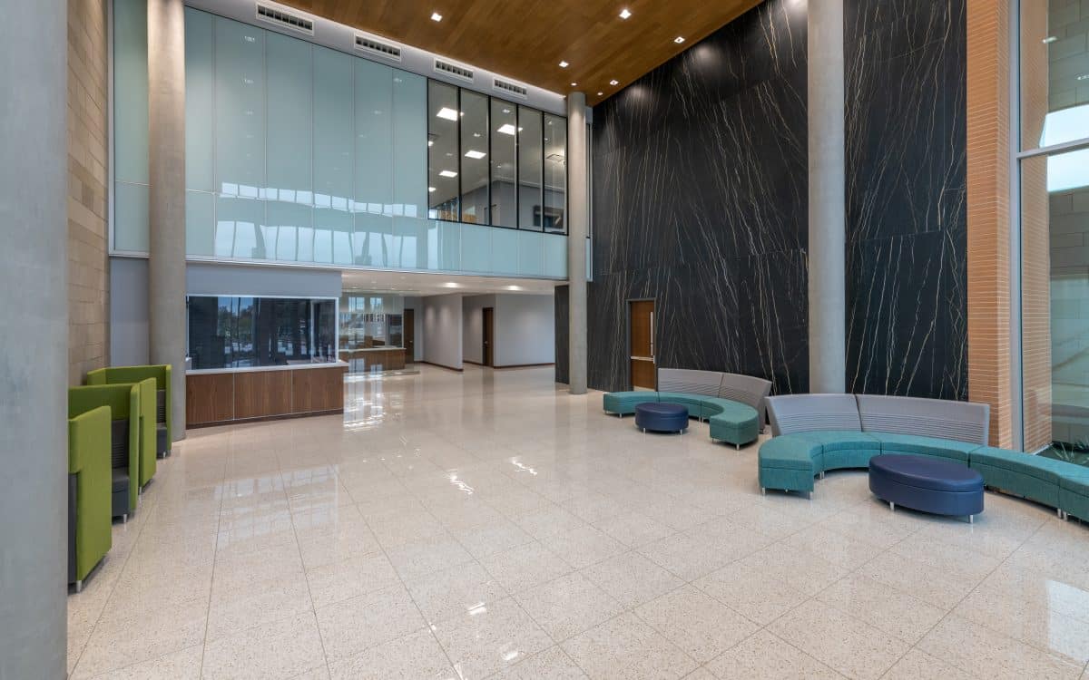 The sleek lobby of a modern office building.