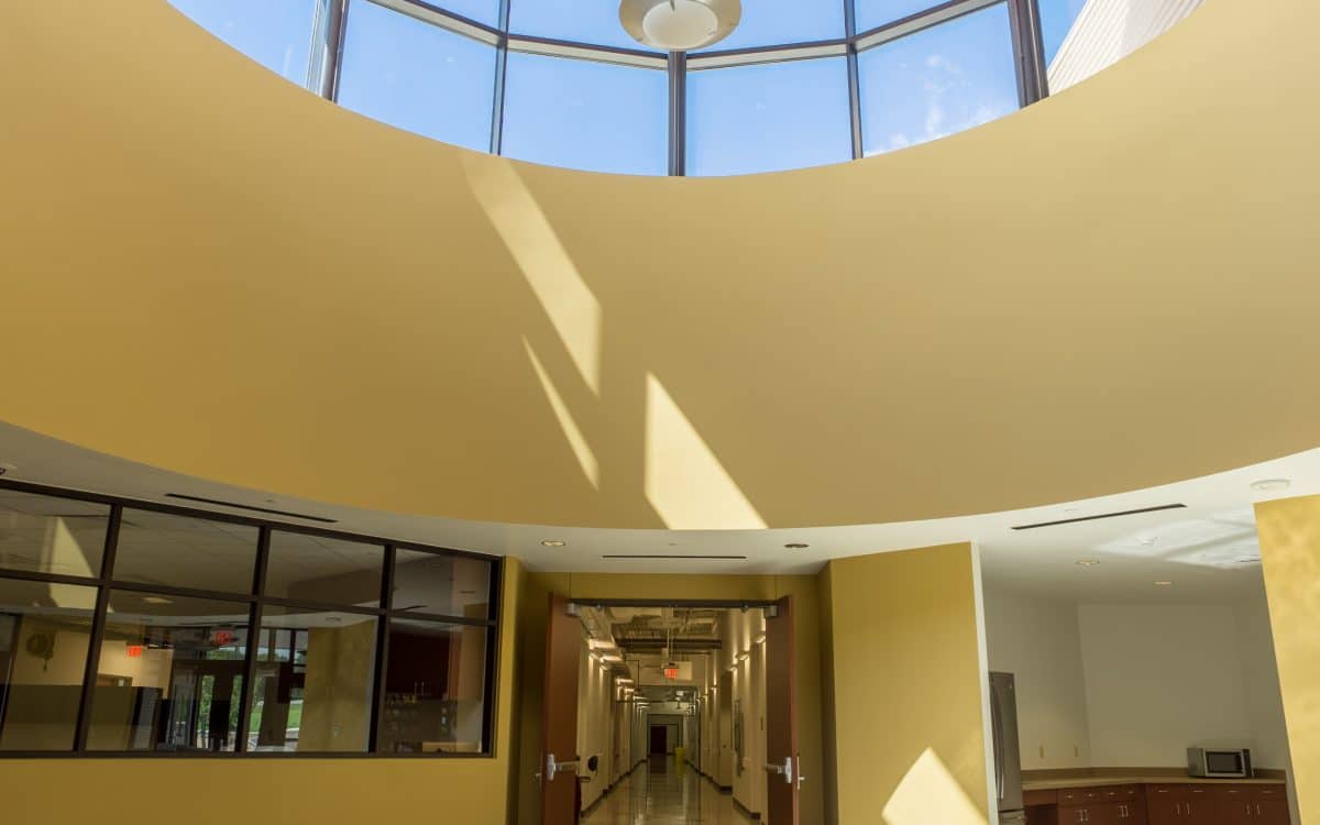 A hallway with a circular ceiling.