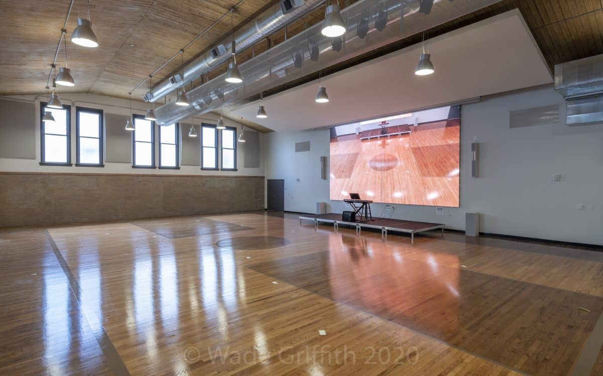 A basketball court in a gym.
