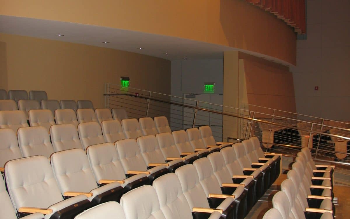Rows of chairs in an auditorium.
