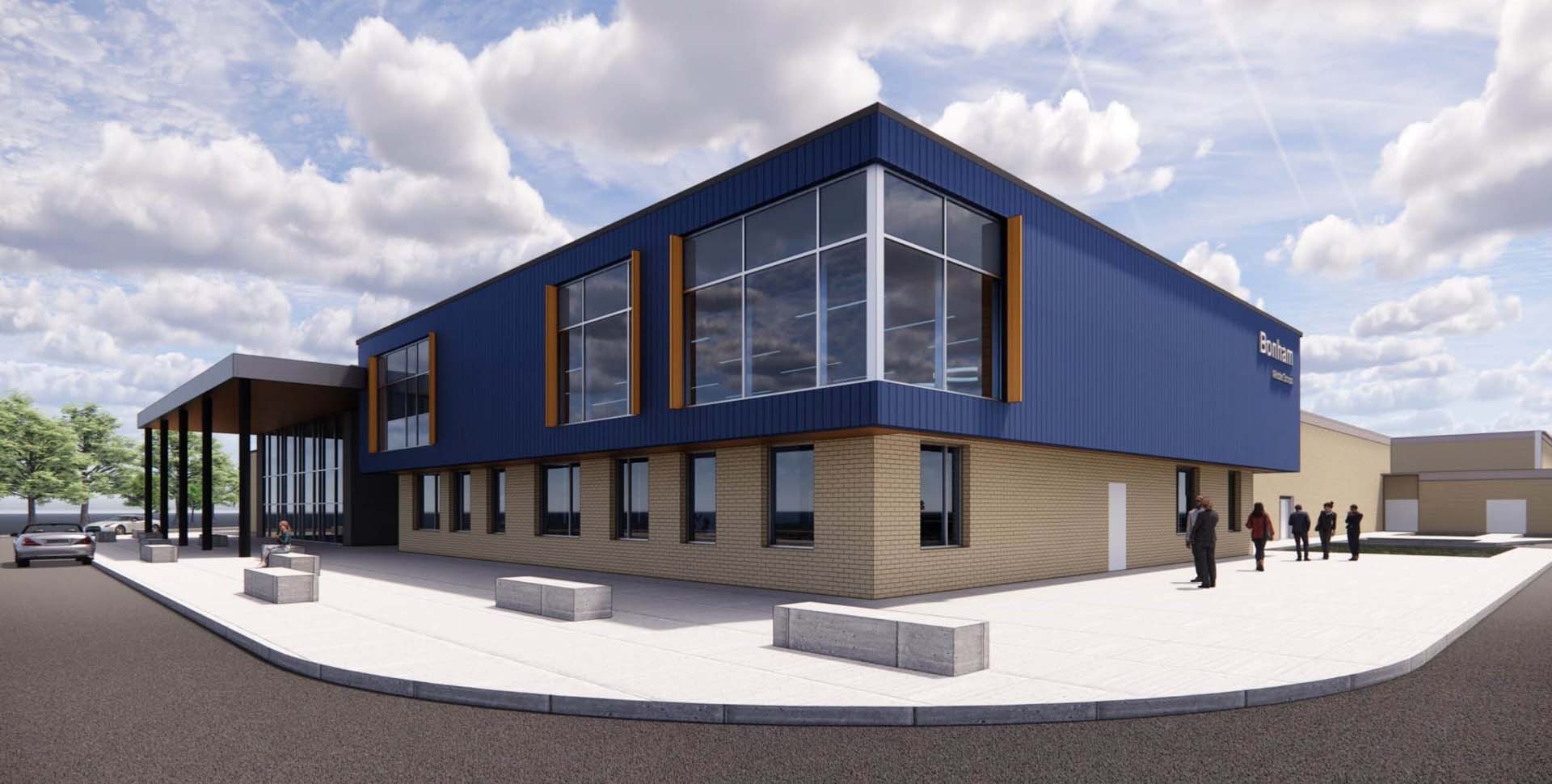 A modern two-story building with large windows, blue upper facade, and beige brick lower level; several people stand near the entrance under a partly cloudy sky.