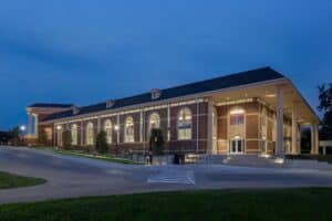 exterior view of a college campus building at early dawn